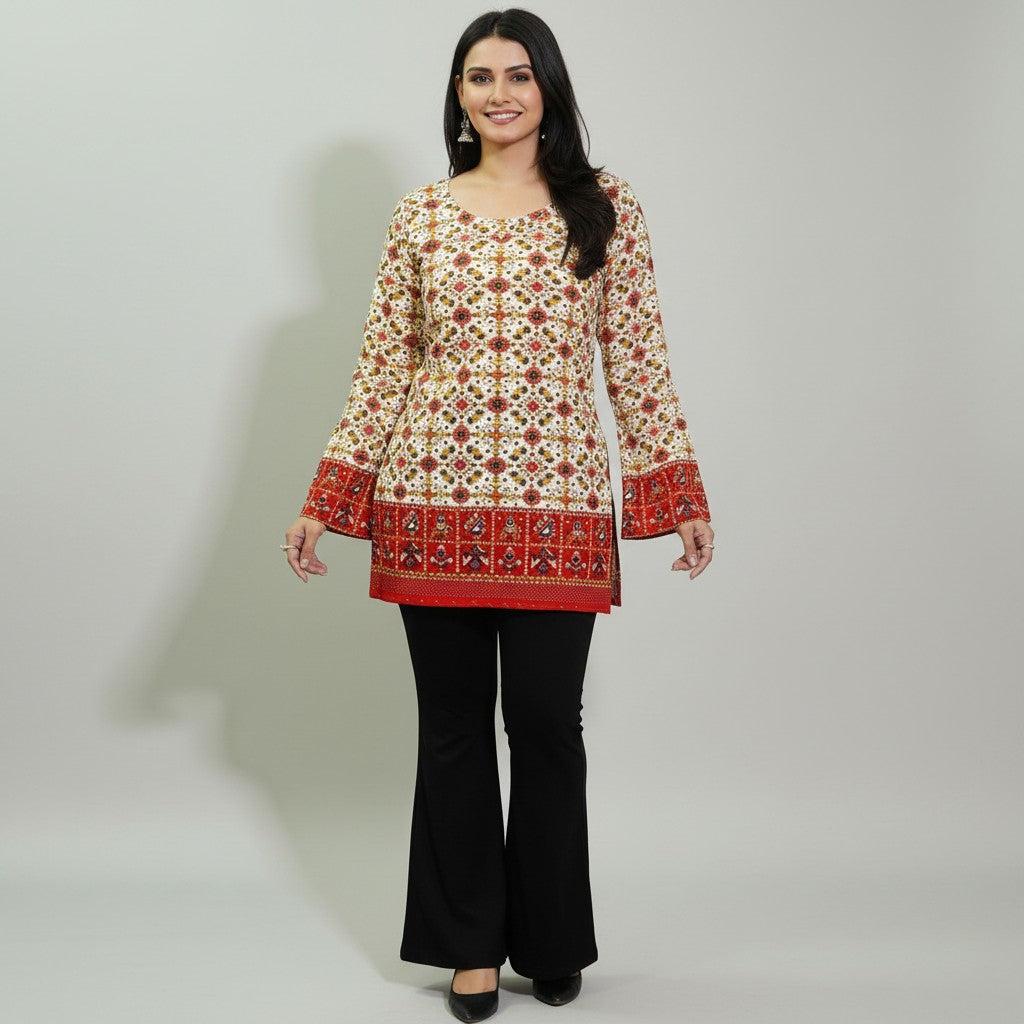 Entici Siara Ruby Swarovski cotton kurti with ethnic print, flared sleeves, and V-neck, worn with black trousers.