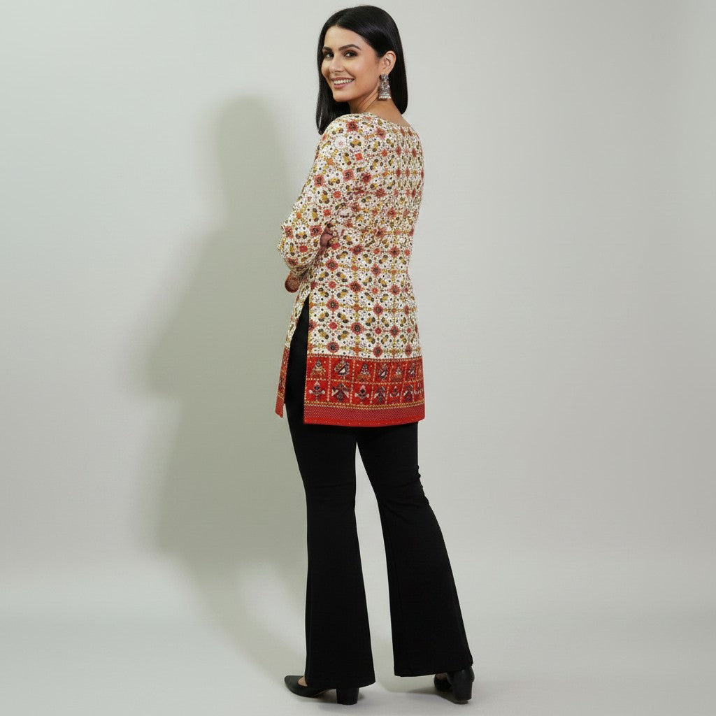 Model wearing Entici Siara Ruby Swarovski cotton kurti with ethnic print, flared sleeves, and black trousers